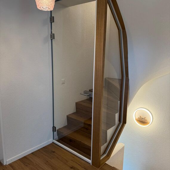 Glastüre als Treppenabschluss